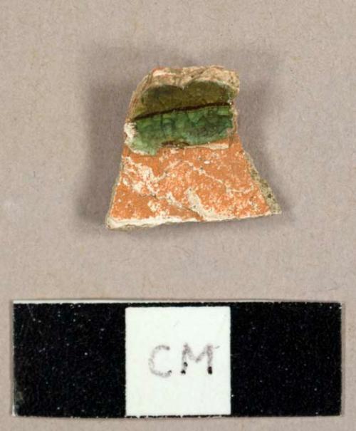 Earthenware sherd with red slip and green and cream lead glaze