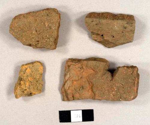 Brick fragments, including at least one roof tile fragment