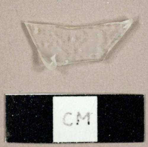 Colorless bottle glass fragment, possibly from a flask