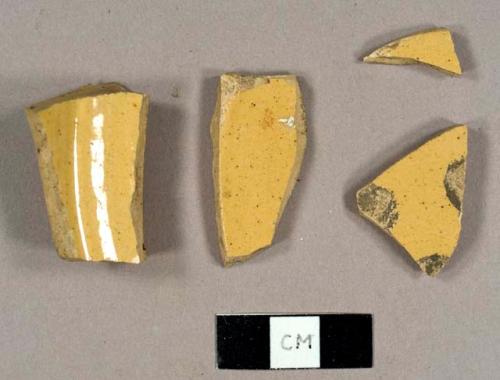 Yellowware sherds, including a base sherd to a bowl