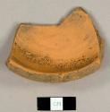 Unglazed refined redware base sherd of a straight-sided bottle