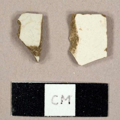 White salt-glazed stoneware sherds, including one base sherd to a saucer