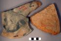Sherds from griddle with mat impressions on one side.