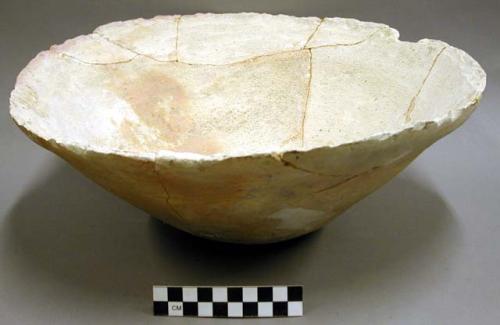 Ceramic bowl, plain, chipped rim, flat bottom, reconstructed