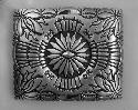 Silver belt buckle, rectangular with overall stamped designs
