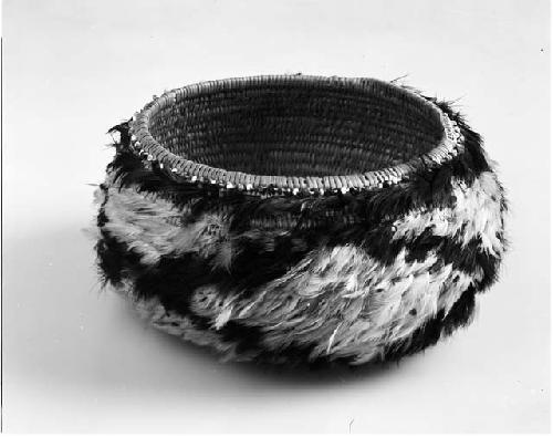 Pomo feathered basket, coiled bowl shape