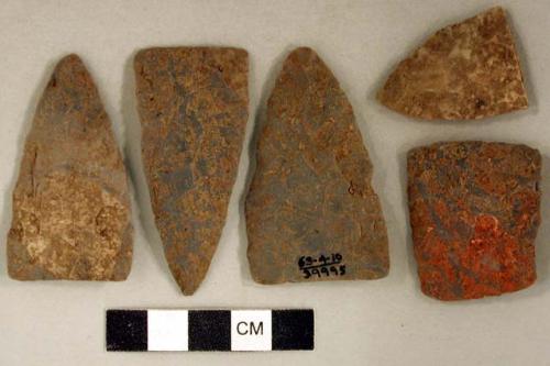 Chipped stone, projectile points, triangular; chipped stone, biface fragments, one with red ochre