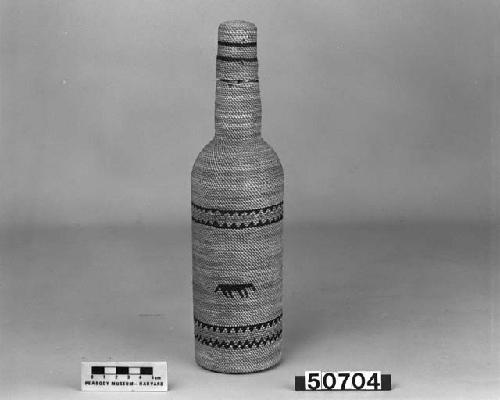 Covered bottle, from the collection of J.G. Swan. Wrapped twined.