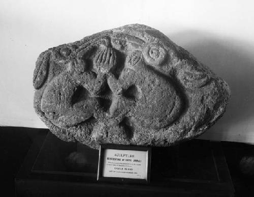 Carved stone depicting bird-men