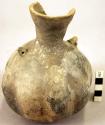 Ceramic bottle, flaring neck, 2 perforated lug handles, acorn squash shaped body