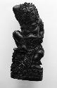 Ironwood carving of Boeta Sari, the bad god who became a good god