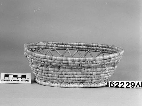 Elliptical basket from the collection of J. Daniels, 1902. Close coiled.