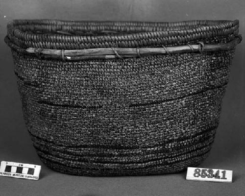 Burden basket from a collection through G. Nicholson. Coiled, split stitches, imbricated.