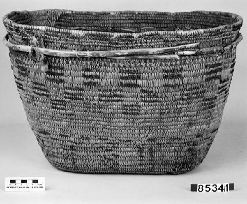 Burden basket from a collection through G. Nicholson. Coiled, split stitches, imbricated.