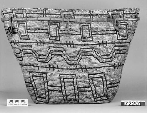 Burden basket from the collection of G.T. Emmons. Coiled, imbricated, split stitches.