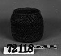 Small, jar-shaped basket from the collection of G. Nicholson. Coiled, one-rod foundation.