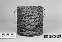 Cylindrical basket with cord handle from the collection of Lt. Woodworth ca.1878. Plain, open-twined; crossed warps.