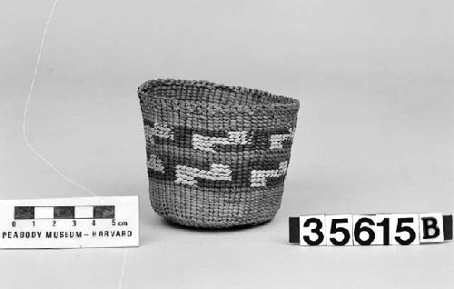 Cylindrical basket from the collection of L.T. and J.S. Swaim, ca.1900. Plain twined, false embroidery.