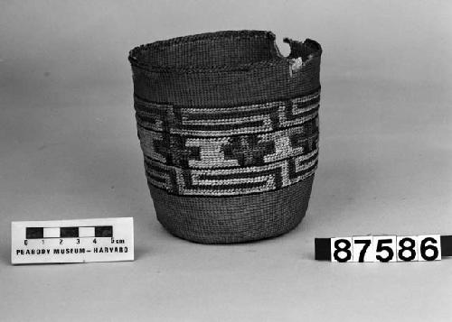 Cylindrical basket from the collection of Mrs. H.S. Grew. Plain twined, false embroidery.