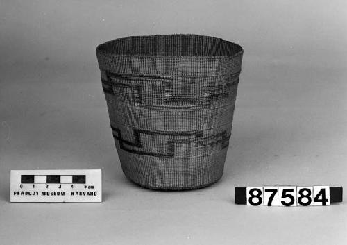 Cylindrical basket from the collection of Mrs. H.S. Grew. Plain twined, false embroidery.