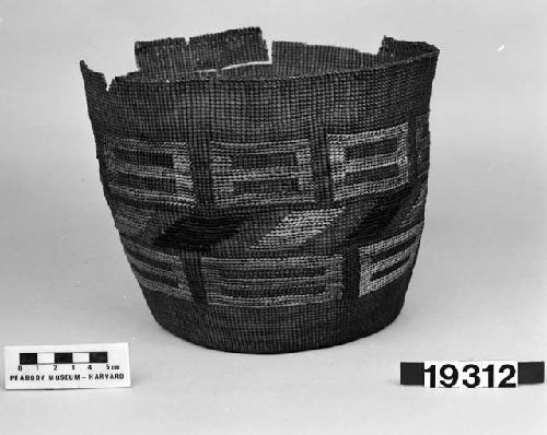 Cylindrical basket from the collection of J.S. and C.T.D. Swaim, 1900-40. Plain twined, false embroidery.