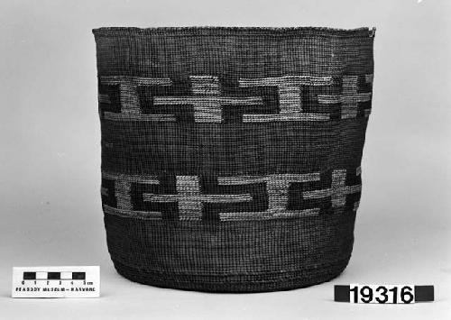 Cylindrical basket from the collection of J.S. and C.T.D. Swaim, 1900-40. Plain twined, false embroidery.