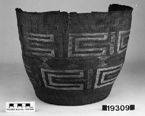 Cylindrical basket from the collection of J.S. and C.T.D. Swaim, 1900-40. Plain twined, false embroidery.