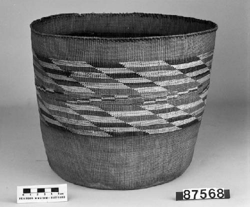 Cylindrical basket from the collection of G. Nicholson. Plain twined, false embroidery.