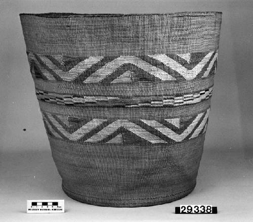 Cylindrical basket from the collection of E.H. Washlaun. Plain twined, false embroidery.