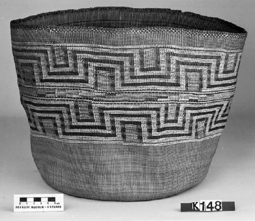 Cylindrical basket from the collection of F.H. Curtiss, 1895. Plain twined, false embroidery.