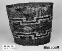 Cylindrical basket from the collection of J.S. and C.T.D. Swaim, 1900-40. Plain twined, false embroidery.