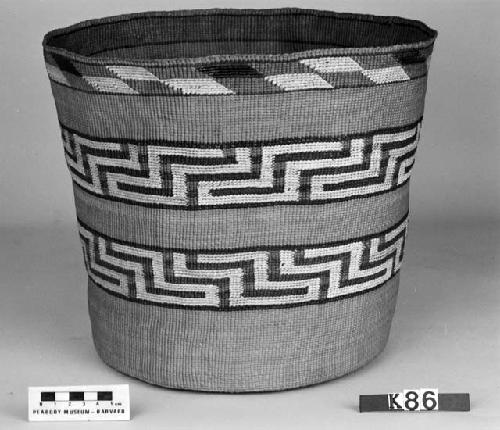 Cylindrical basket from the collection of the father of F.H. Curtiss. Plain twined, false embroidery.