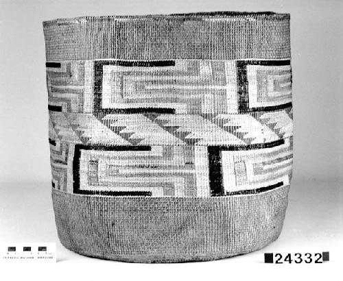 Cylindrical basket from the collection of E. McDougall, 1927-40. Plain twined, false embroidery.