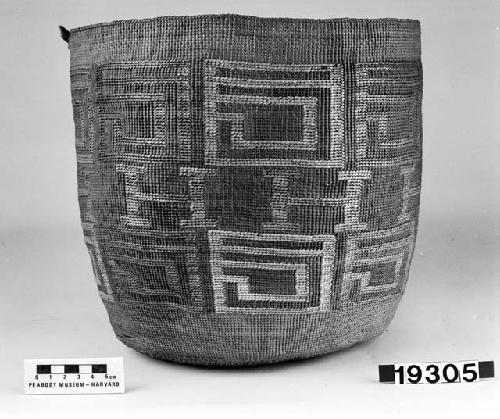 Cylindrical basket from the collection of J.S. and C.T.D. Swain, 1900-40. Plain twined, false embroidery.