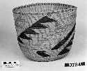 Cylindrical basket, collected 1897. Plain twined, false embroidery.