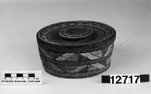 Trinket basket with rattle lid from the collection of the brothers of Mrs. J.M. Robinson, 1883-1925. Twined, false embroidery.