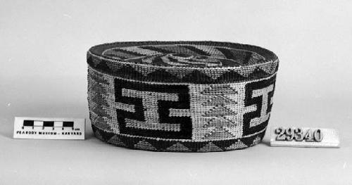 Trinket basket with rattle lid from the collection of E.H. Washburn. Plain twined, false embroidery.