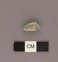 Small triangular jade pendant - 14.5x5x3 mm.