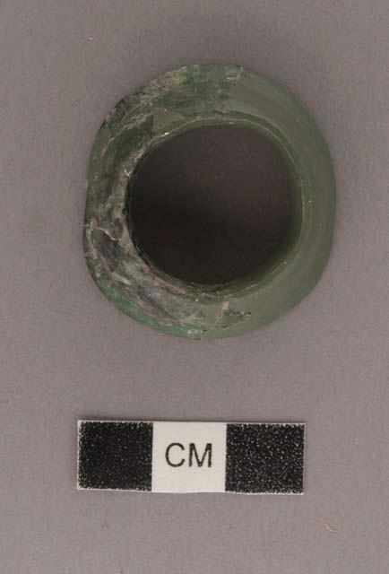 Jade cup-shaped flare with 7 fragments - diam. 36.6 mm.