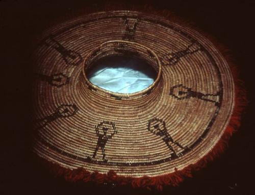 Bottle-necked basket decorated with two dark bands in rattlesnake pattern and ei