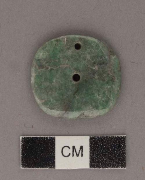 Perforated jadeite disk