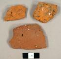 Red and orange brick fragments