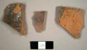 Refined redware sherds with brown glaze