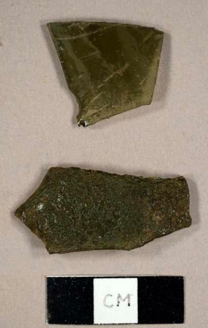 Olive green bottle glass fragments, one slightly burned