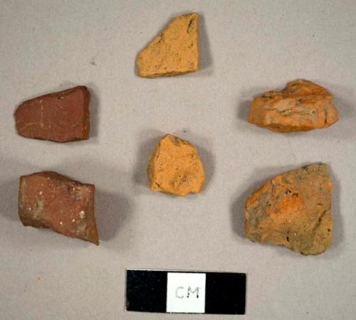 Brick fragments, including one possible redware sherd