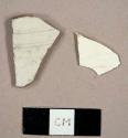 White salt-glazed stoneware sherds with molded ribbing