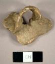 Lead fragment, possibly part of a latch or escutcheon plate