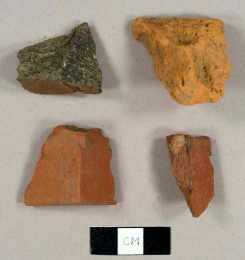 Brick fragments, possibly including some refined redware sherds