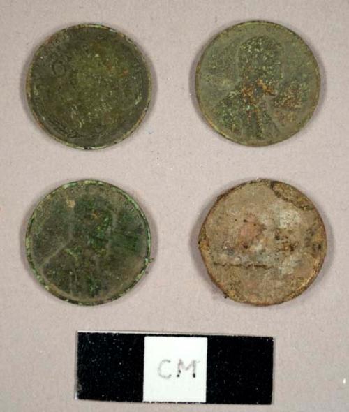 U.S. Copper pennies, including two wheat pennies from 1953 and 1927 and two Lincoln Memorial pennies, one dating to 1961