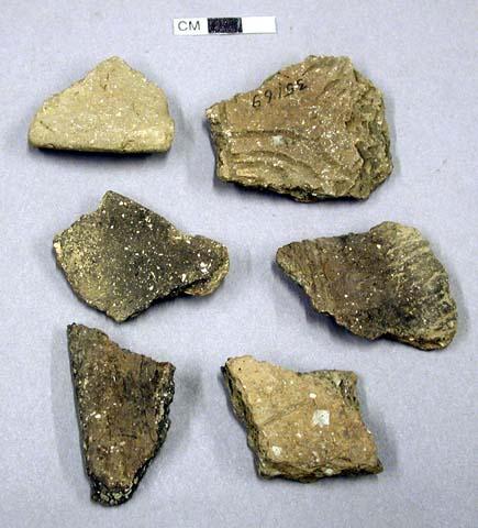 Ceramic, earthenware rim and body sherds, shell-tempered, includes undecorated, cord-impressed, and incised designs